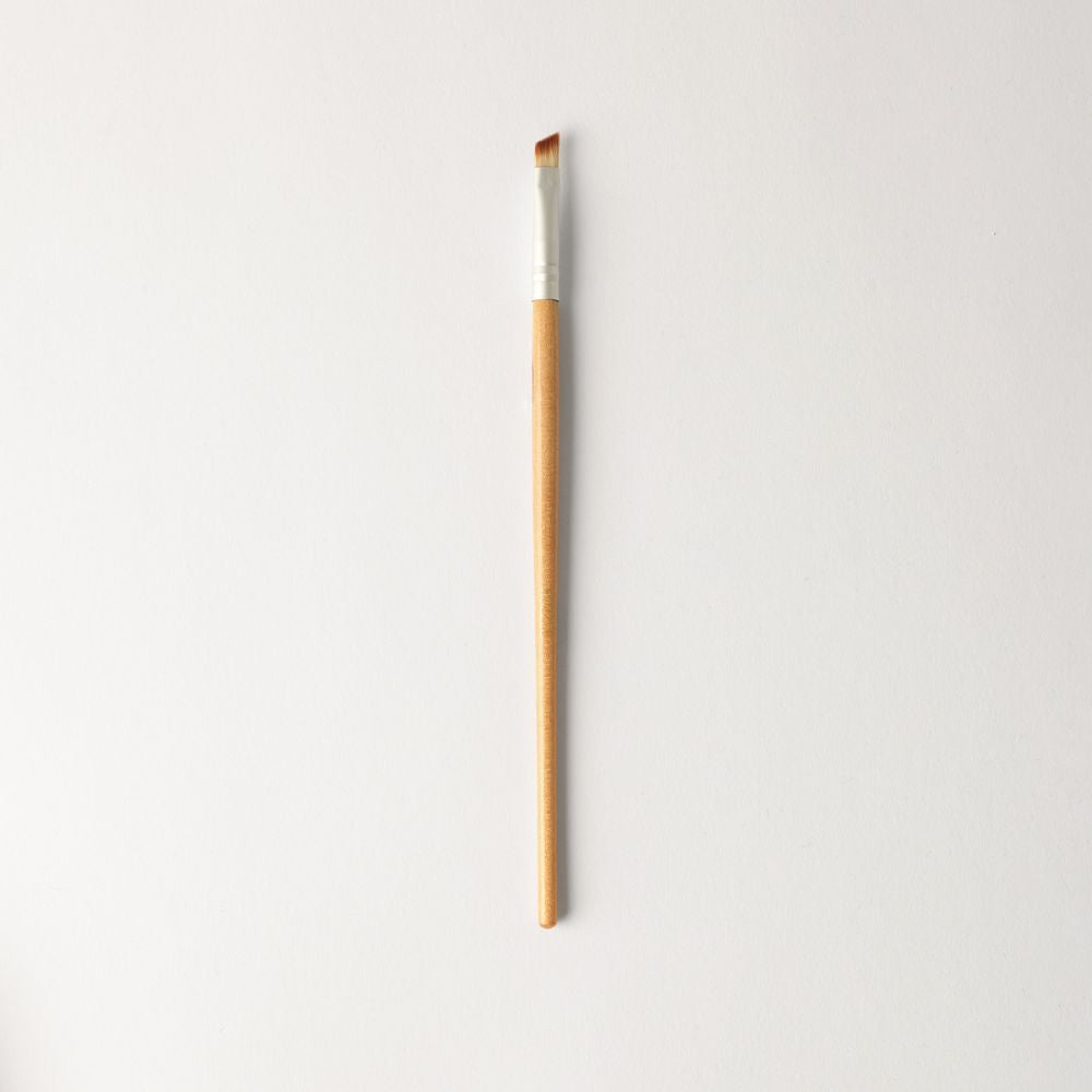 Puzzle Makeup Angled Brush - vegan precision tool for eyeliner, corner shadow, and smudging