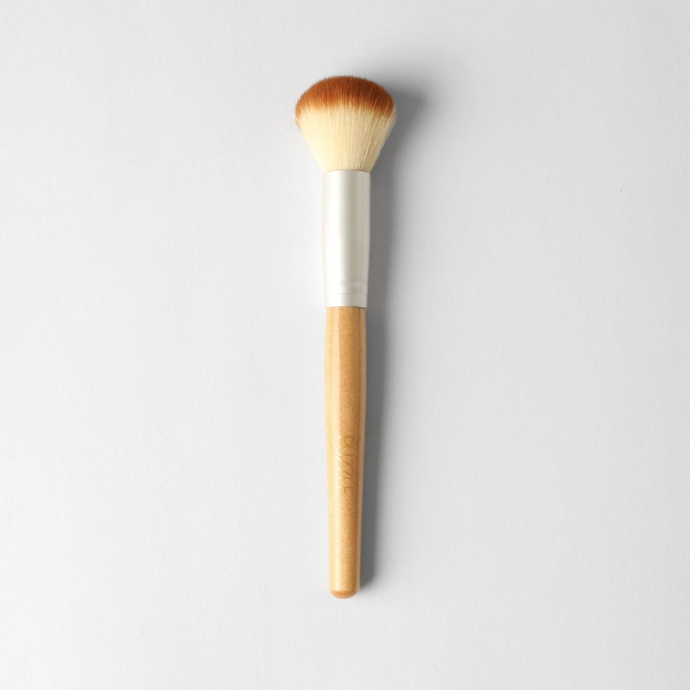 Puzzle Makeup Blush and Highlighter Brush close-up - soft vegan bristles for seamless blush and highlight application