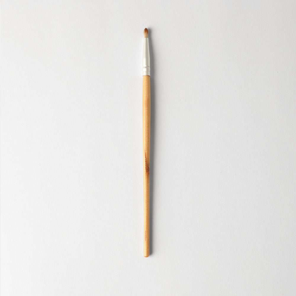 Puzzle Makeup Mini Eyeshadow Brush - vegan precision brush for detailed lining and highlighting