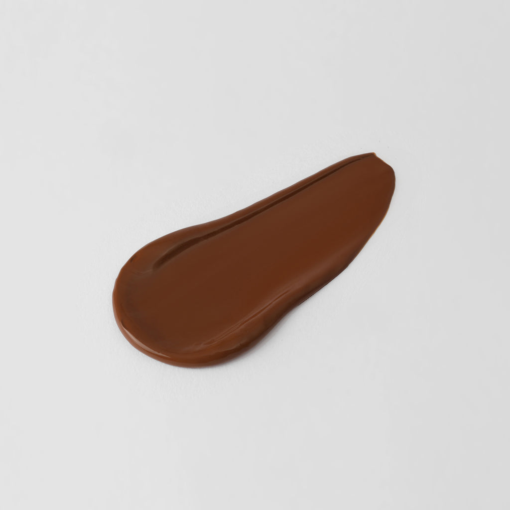 The Overachiever tinted moisturizer and foundation swatch in Cacao – vegan, buildable, skin-loving formula by Puzzle Makeup