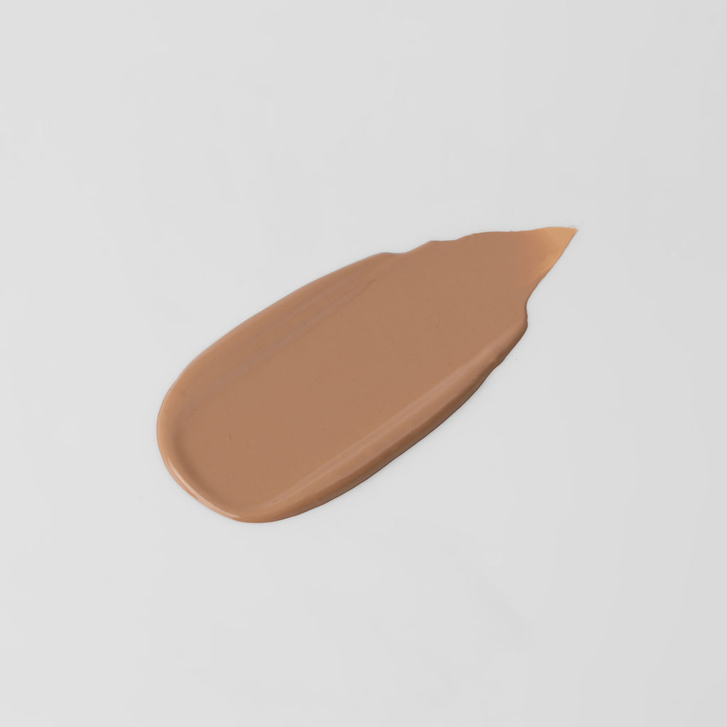 The Overachiever tinted moisturizer and foundation swatch in Sun Kiss – vegan, buildable, skin-loving formula by Puzzle Makeup